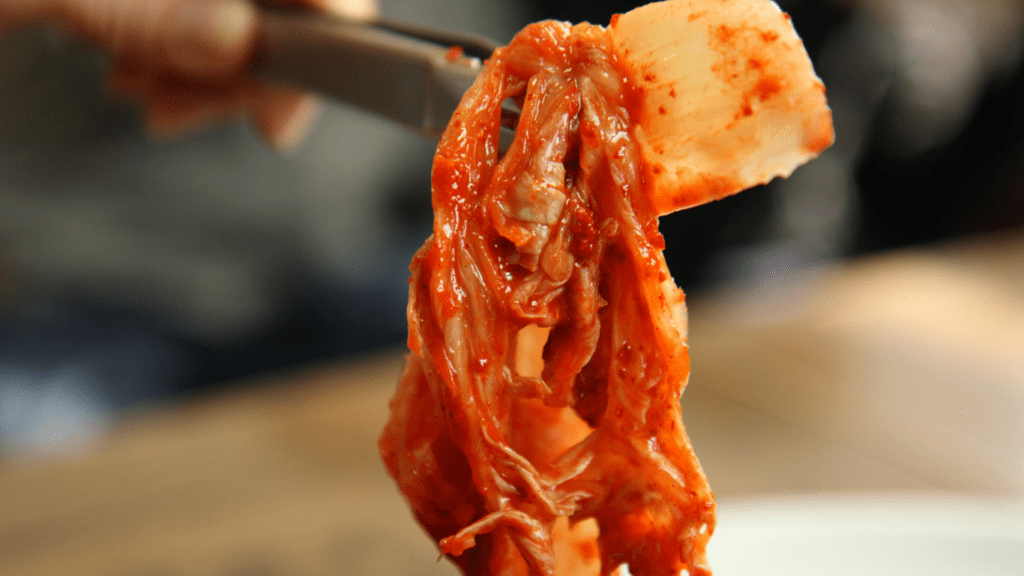 a close up of a piece of kimchi