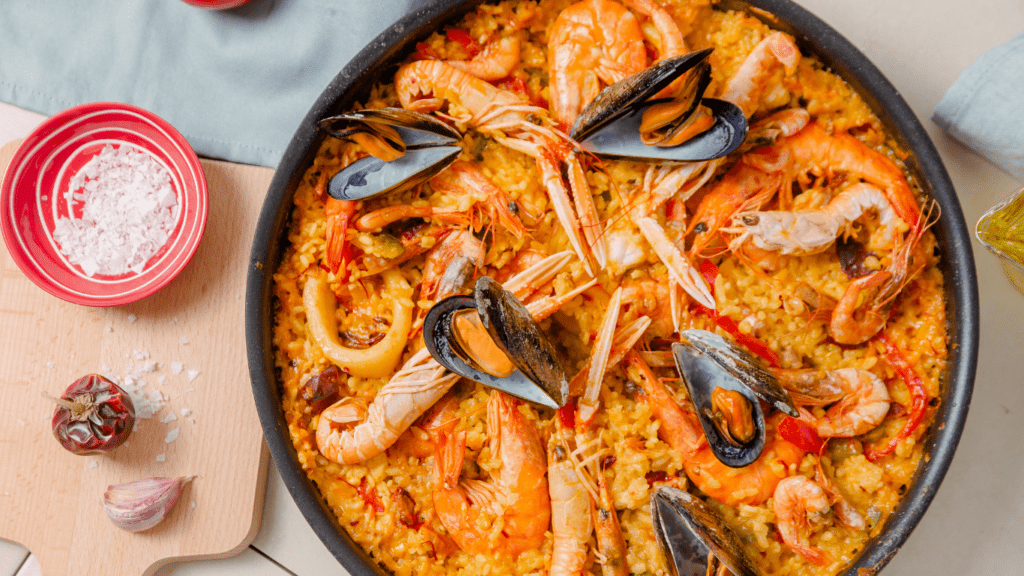 spanish paella paella with mussels and shrimp in a pan