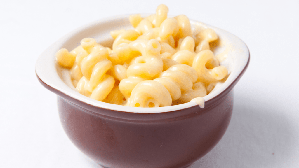 cheesy pasta bake in a white 