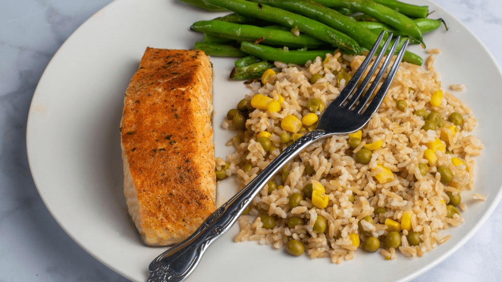 plate with salmon and asparagus on them