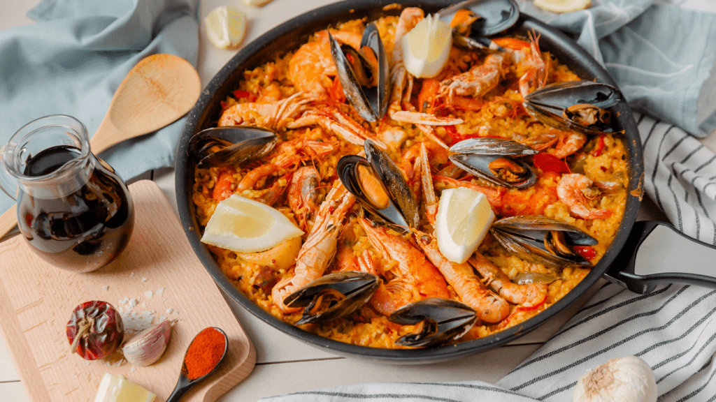 spanish paella paella with mussels and shrimp in a pan